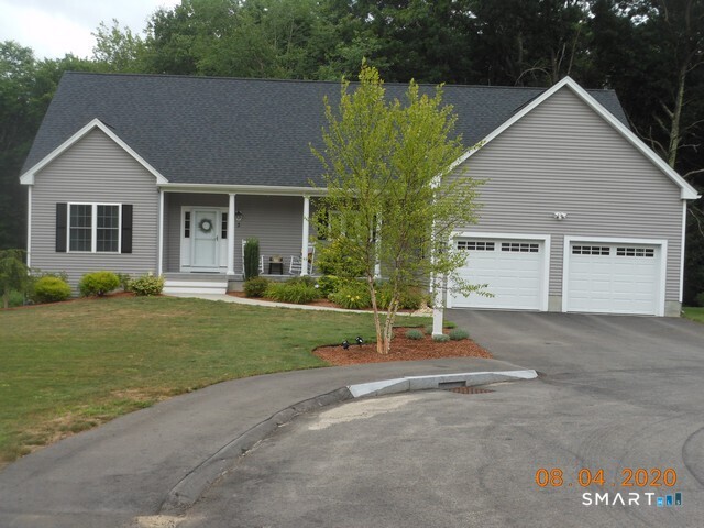 80 Aldrich Road Putnam, CT 06260 - Photo 8 of 23 a view of a house with a yard and plants