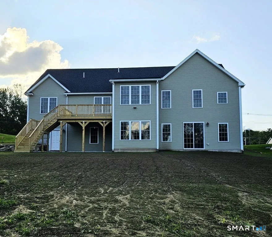 80 Aldrich Road Putnam, CT 06260 - Photo 9 of 23 a front view of a house with a yard