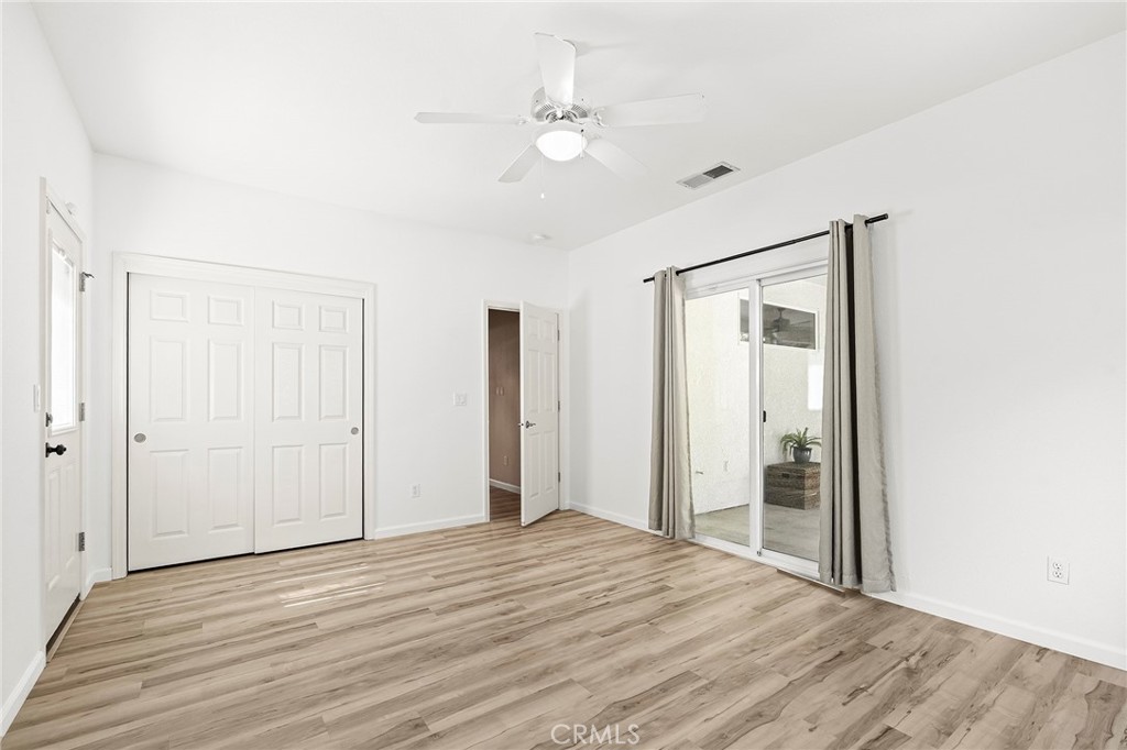 2262 Honey Run Road Chico, CA 95928 - Photo 26 of 74 a view of a livingroom with wooden floor and white walls