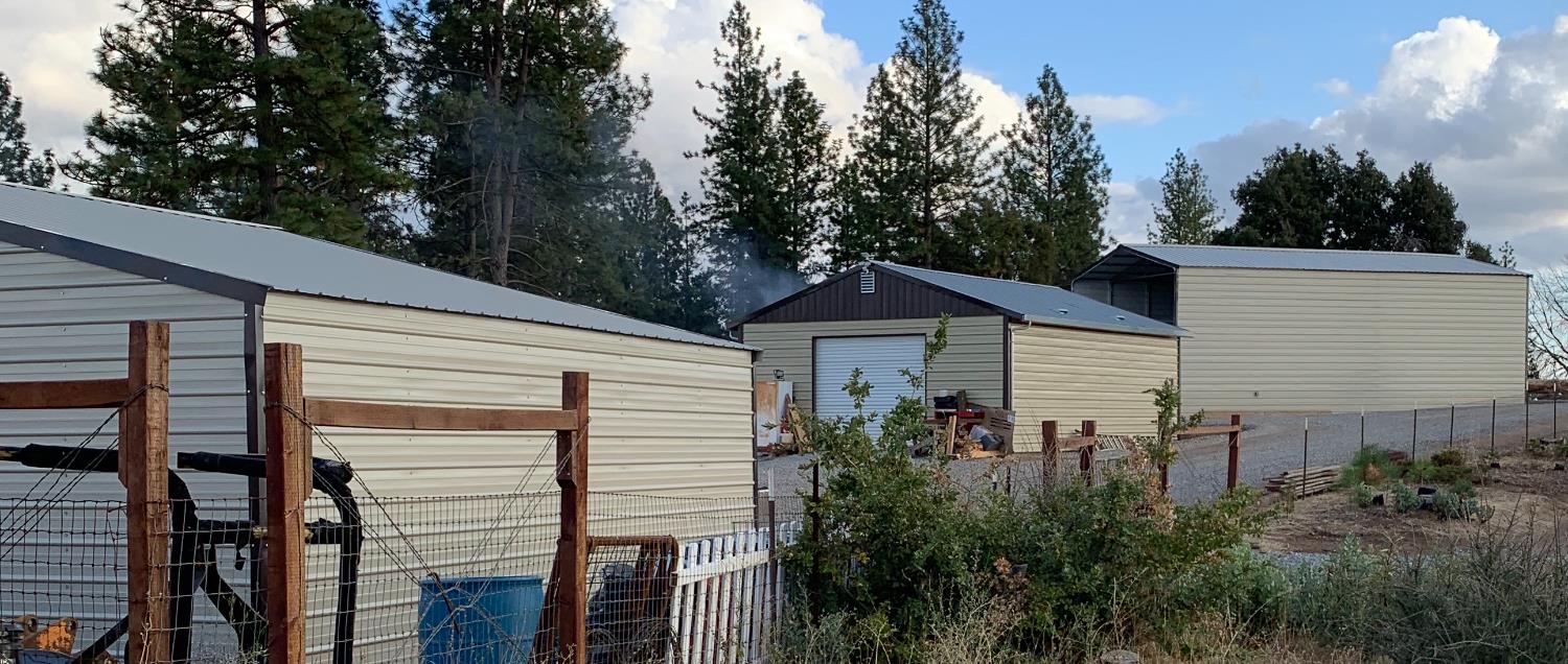 17958 Creations Way Mountain Ranch, CA 95245 - Photo 10 of 28 Left to right: Four-car carport oversized garage with workshop and full power RV barn with solar array, battery bank, all RV hook-ups, and EV charging station.