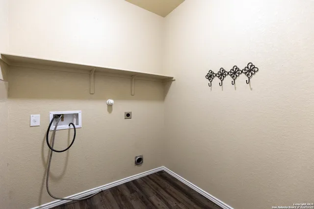 a view of a room with rack on the wall