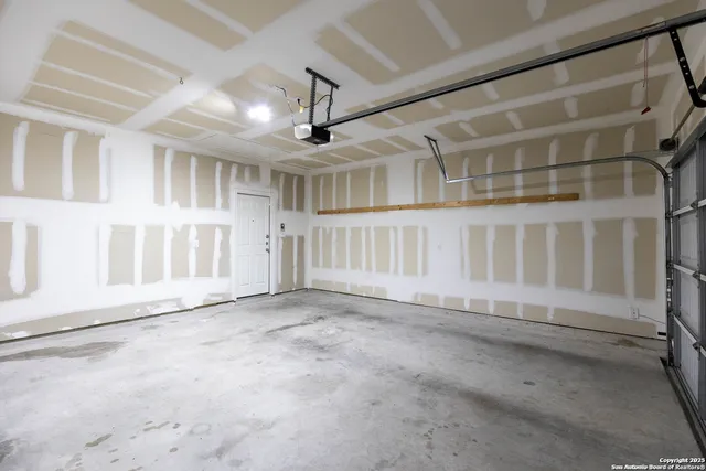 a view of an empty room with stairs