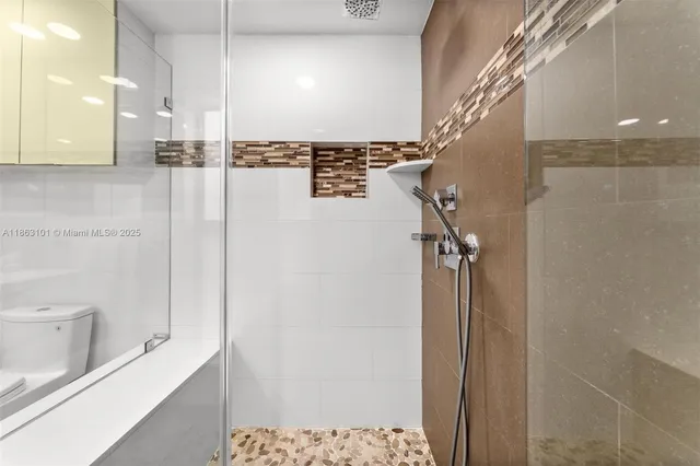 a view of a bathroom with a shower
