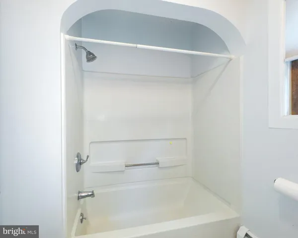 a bathroom with a bathtub