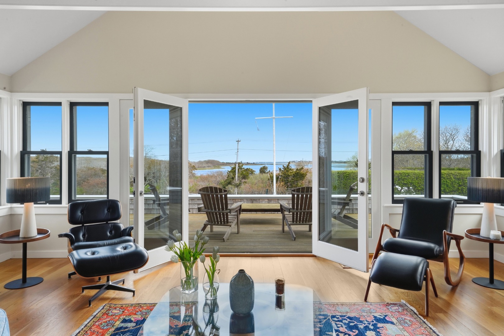 247 Polpis Road Nantucket, MA 02554 - Photo 7 of 52 a living room with furniture and floor to ceiling windows