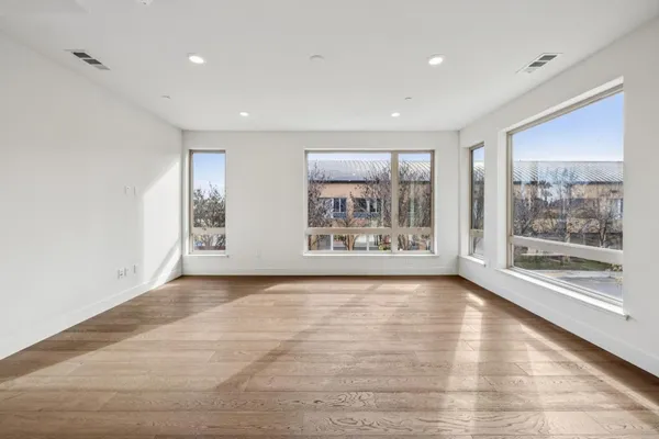 a view of balcony with furniture