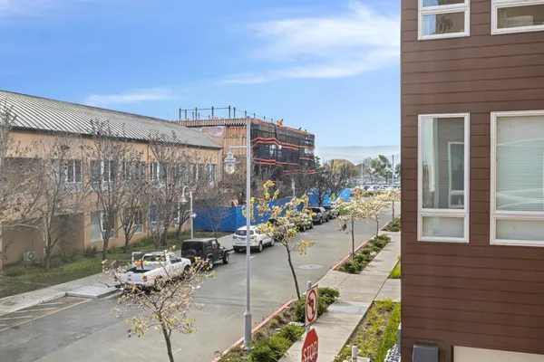 a stove top oven sitting inside of a kitchen