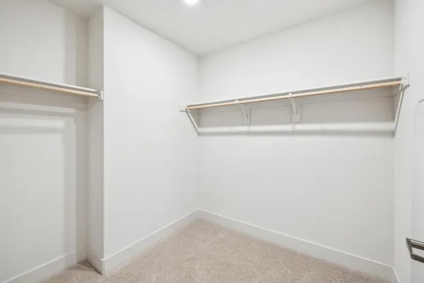 a front view of a house with outdoor seating and yard