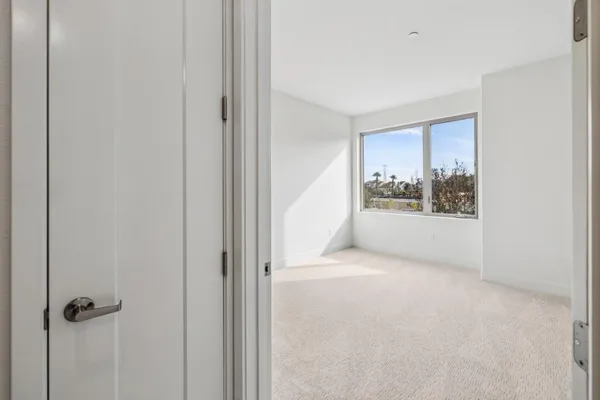 a view of a big yard with a mountain view