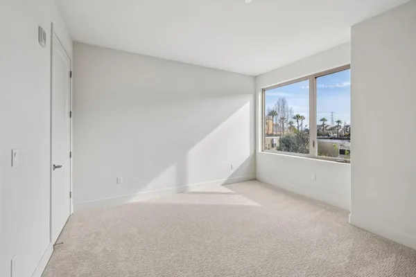 a view of a lake with a big yard