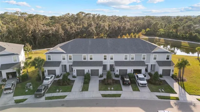 an aerial view of residential house with outdoor space