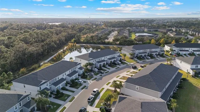 a view of a patio with a table and chairs