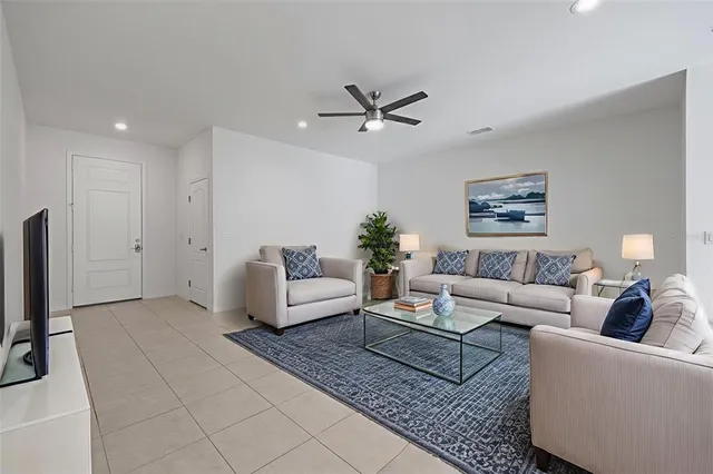 a kitchen with stainless steel appliances granite countertop a sink and a stove