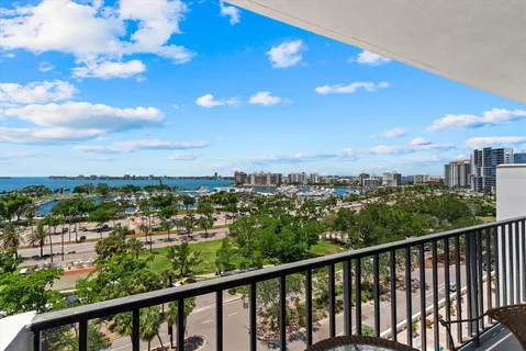 a view of a city skyline from a balcony