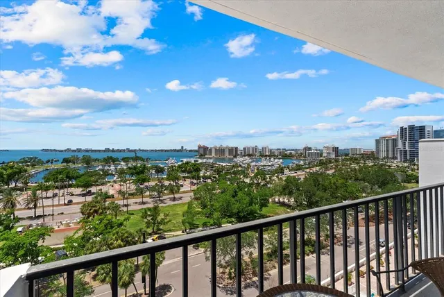 a view of a city skyline from a balcony