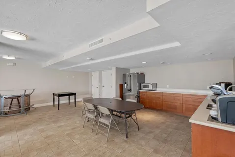 a living room with furniture and a couch