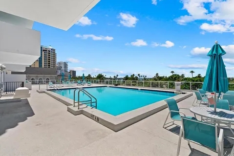 a view of a chairs and table in the terrace
