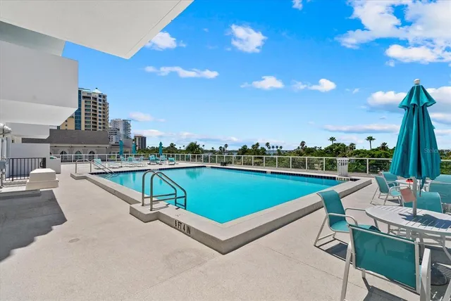 a view of a chairs and table in the terrace