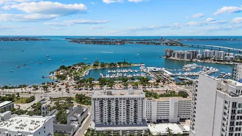 a view of a city with ocean