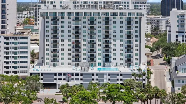 a view of a building with a yard