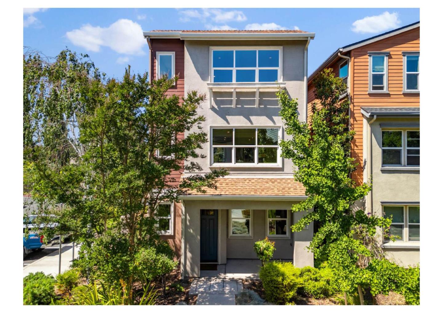 a house view with a garden space