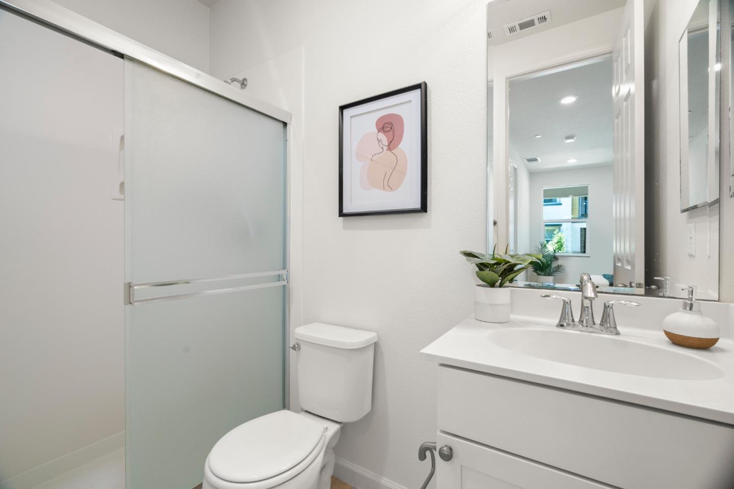 1789 Infinity Way San Jose, CA 95122 - Photo 21 of 44 a bathroom with a toilet sink and mirror