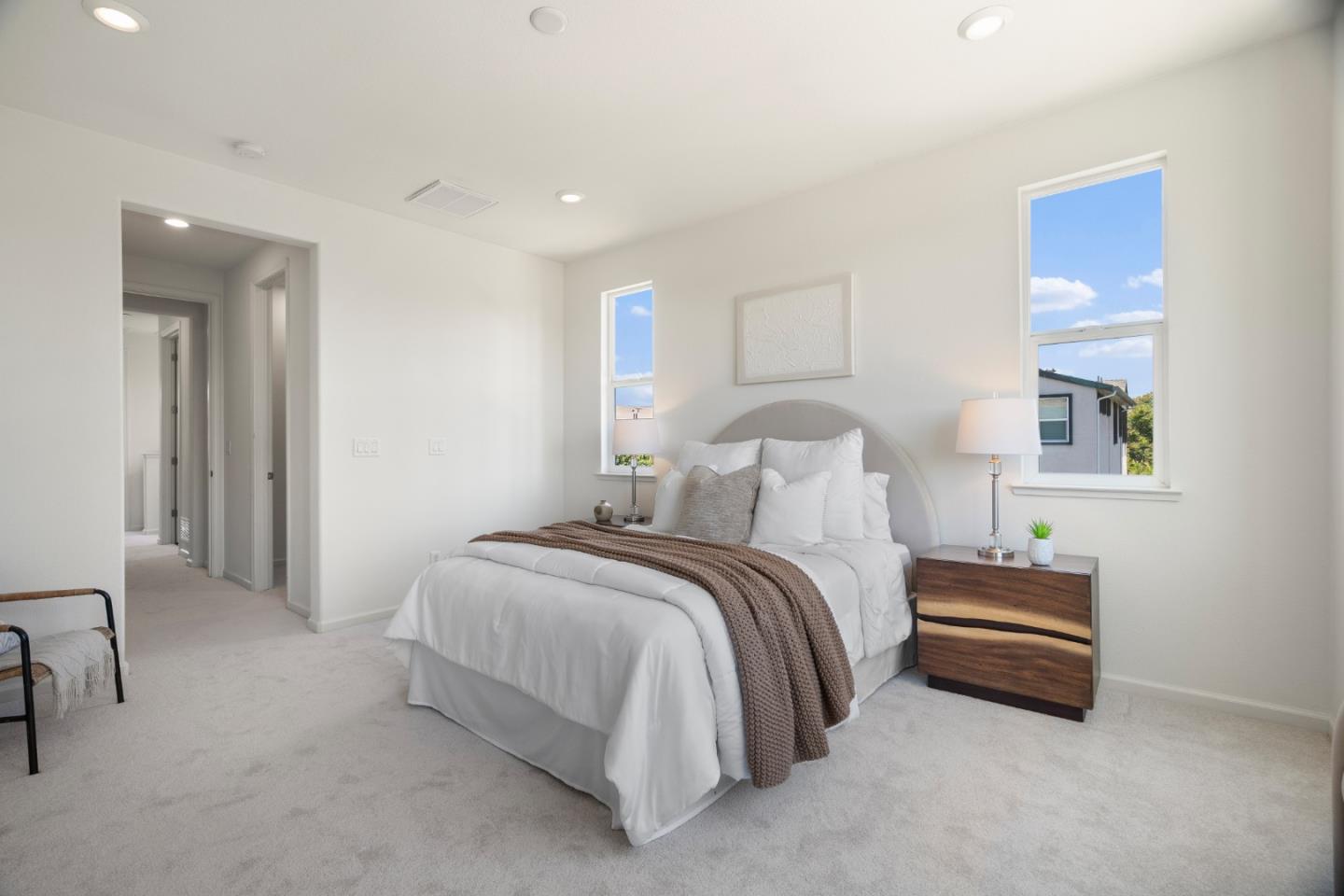 1789 Infinity Way San Jose, CA 95122 - Photo 23 of 44 a bedroom with a bed and a lamp