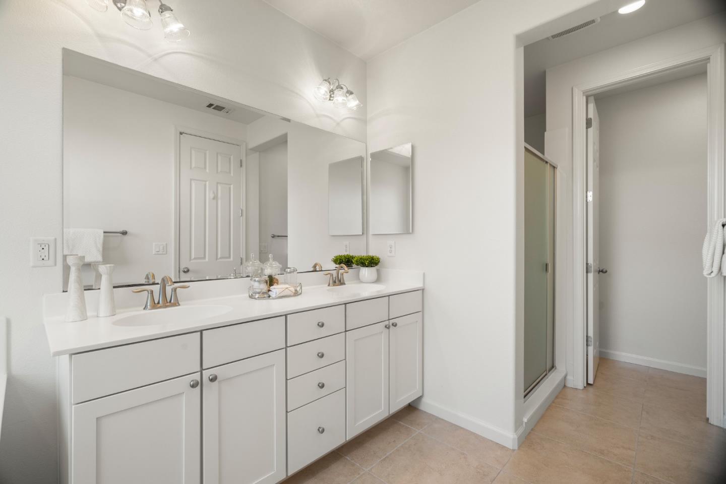 1789 Infinity Way San Jose, CA 95122 - Photo 28 of 44 a bathroom with double sink and a mirror