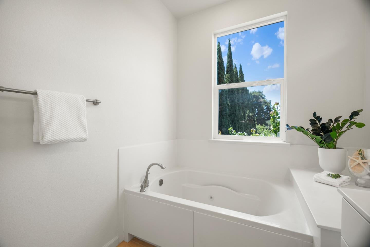 1789 Infinity Way San Jose, CA 95122 - Photo 29 of 44 a white bath tub sitting next to a small window