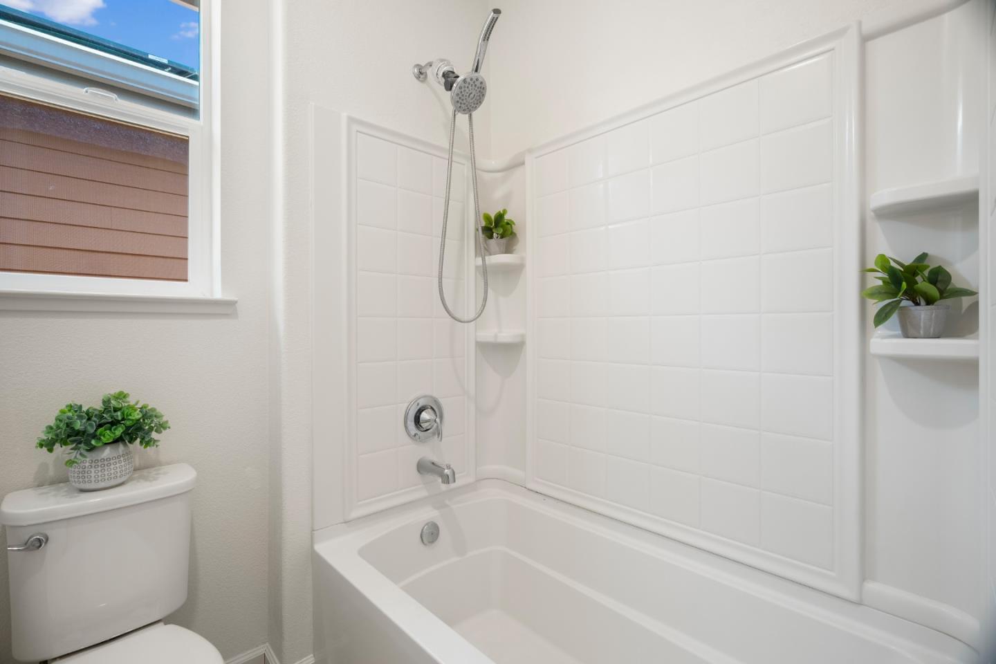 1789 Infinity Way San Jose, CA 95122 - Photo 35 of 44 a bathroom with a bathtub a shower and a toilet