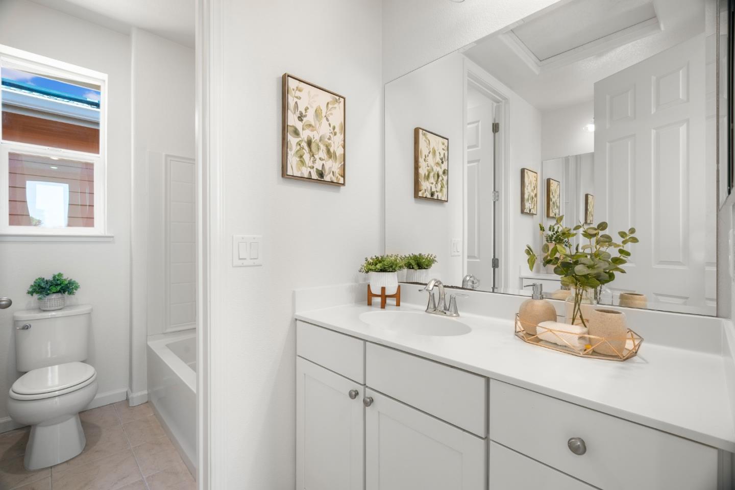 1789 Infinity Way San Jose, CA 95122 - Photo 36 of 44 a bathroom with a sink a toilet and mirror