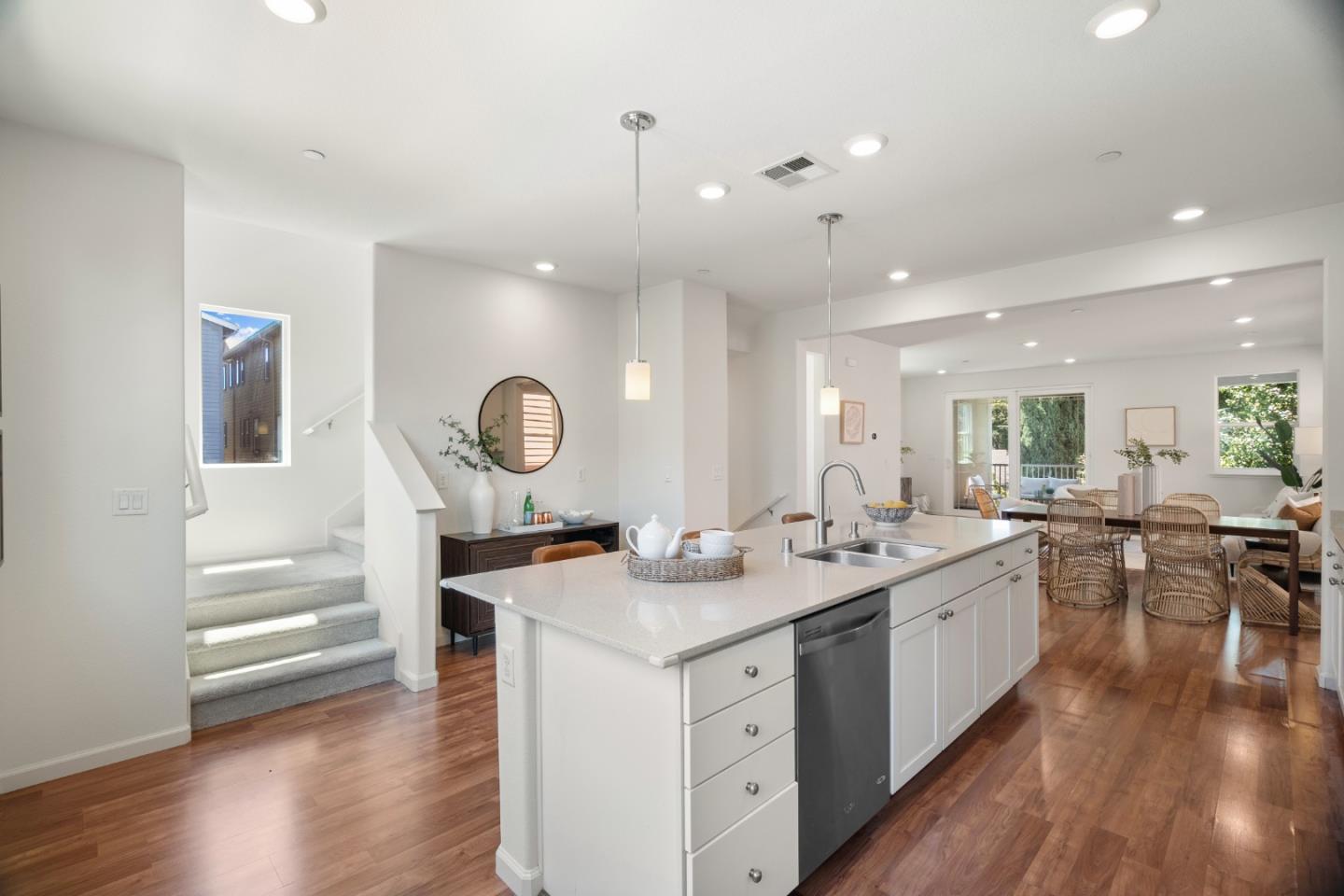 1789 Infinity Way San Jose, CA 95122 - Photo 4 of 44 a kitchen with a sink stove cabinets and wooden floor