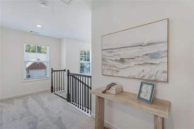 a view of entryway with stairs and furniture