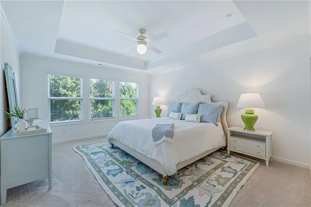 a bed room with a bed and a lamp