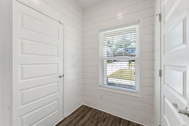 a view of a room that has a window