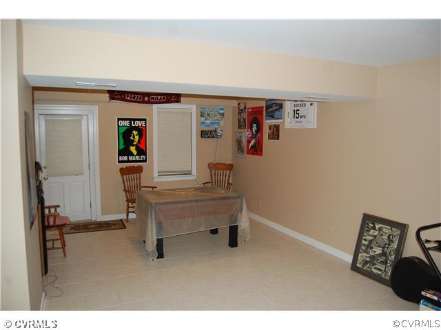 8656 Brown Summit Road Richmond, VA 23235 - Photo 8 of 12 Entertainment Room - Pool Anyone? How 'bout a tee