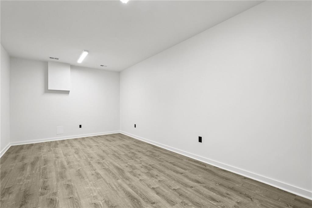 646 Science Street Pittsburgh, PA 15210 - Photo 27 of 35 The finished lower level is perfect for a family room, game room or exercise room.