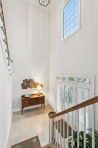 a view of a hallway with seating area