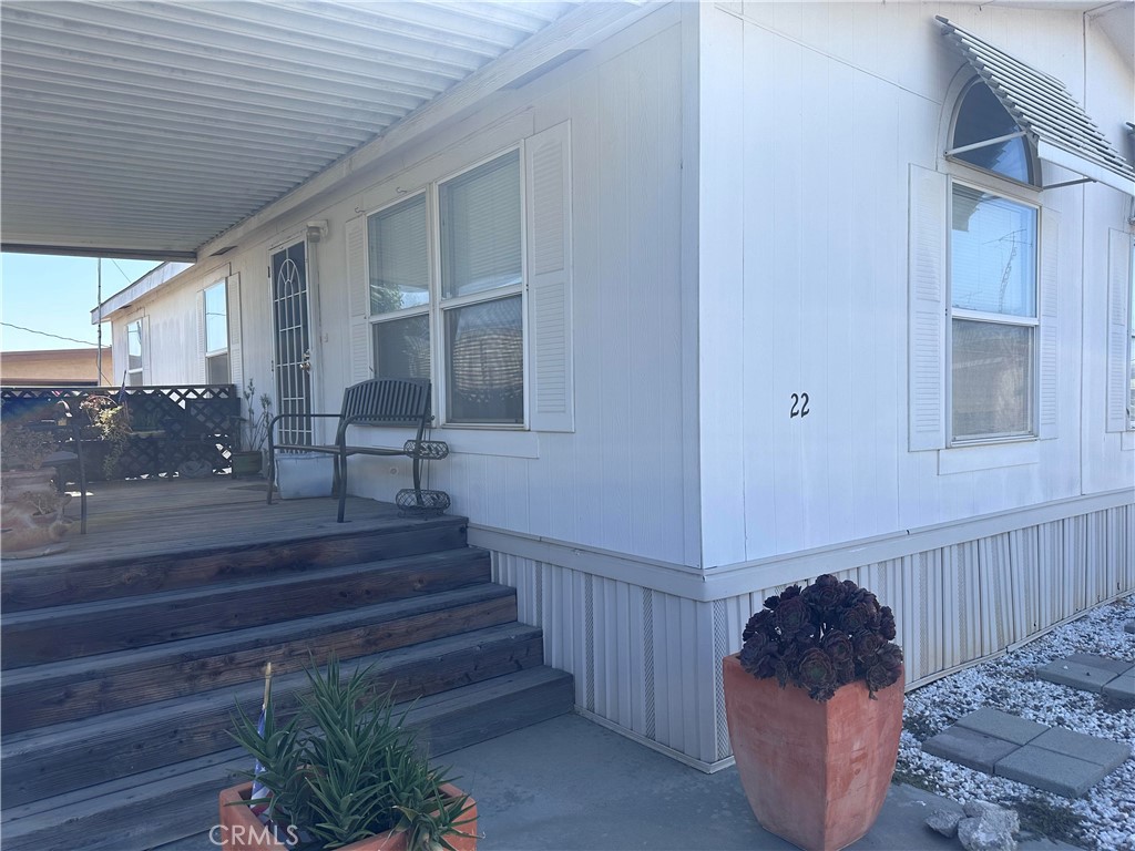 2020 Ashby Road, Unit 22 Merced, CA 95348 - Photo 2 of 25 a view of entryway and hall with wooden floor