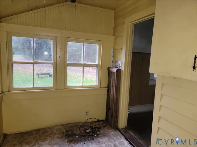 a bathroom with a sink and a window