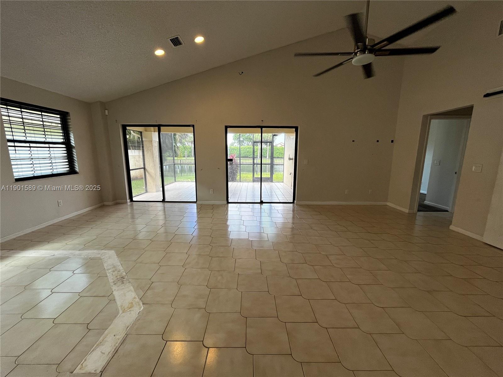 8079 Popash Court Boynton Beach, FL 33472 - Photo 15 of 30 a view of an empty room with a window