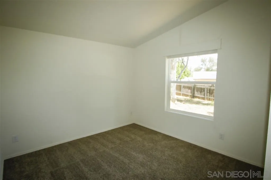 15726 Mussey Grade Road Ramona, CA 92065 - Photo 16 of 17 an empty room with a window
