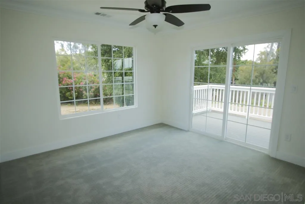 15726 Mussey Grade Road Ramona, CA 92065 - Photo 5 of 17 a view of an empty room with a window