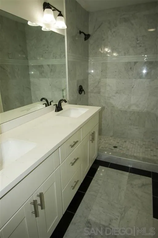15726 Mussey Grade Road Ramona, CA 92065 - Photo 6 of 17 a bathroom with a tub sink and mirror