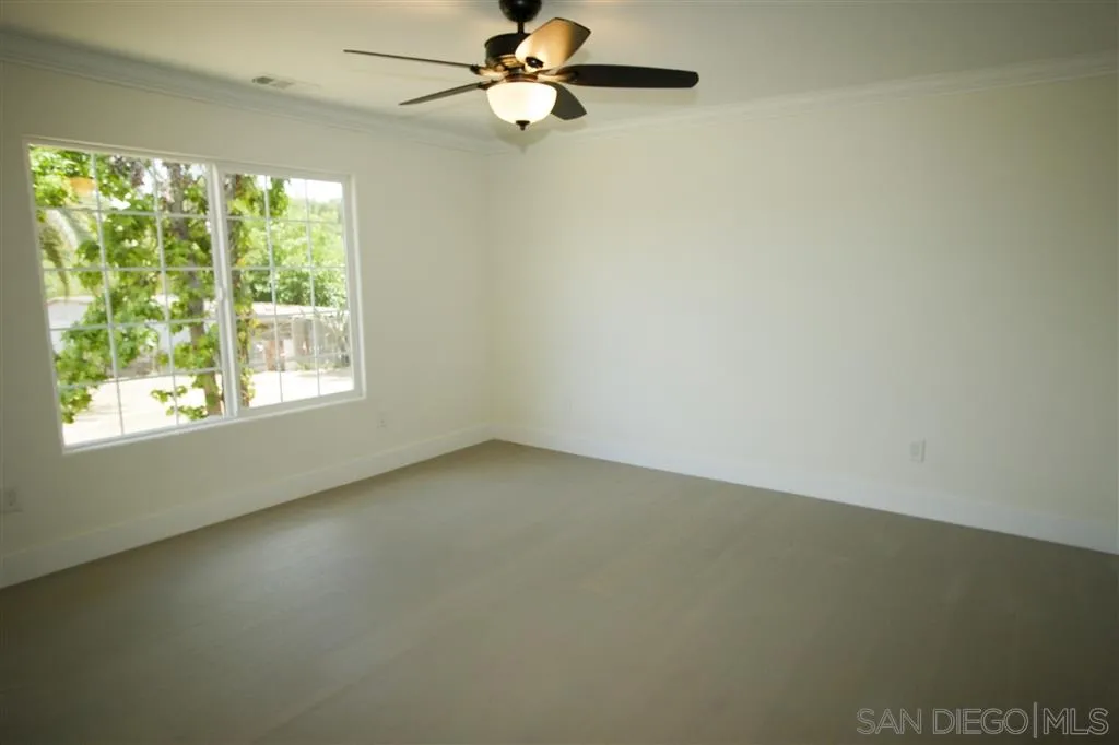 15726 Mussey Grade Road Ramona, CA 92065 - Photo 8 of 17 an empty room with a window