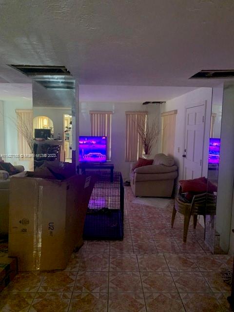 West Little River Miami, FL 33147 - Photo 3 of 5 a living room with furniture and a fireplace