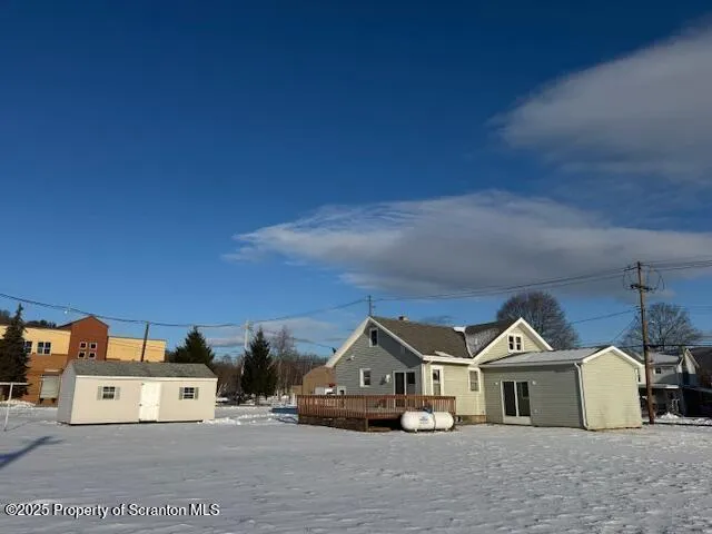 a view of multiple houses with a city street