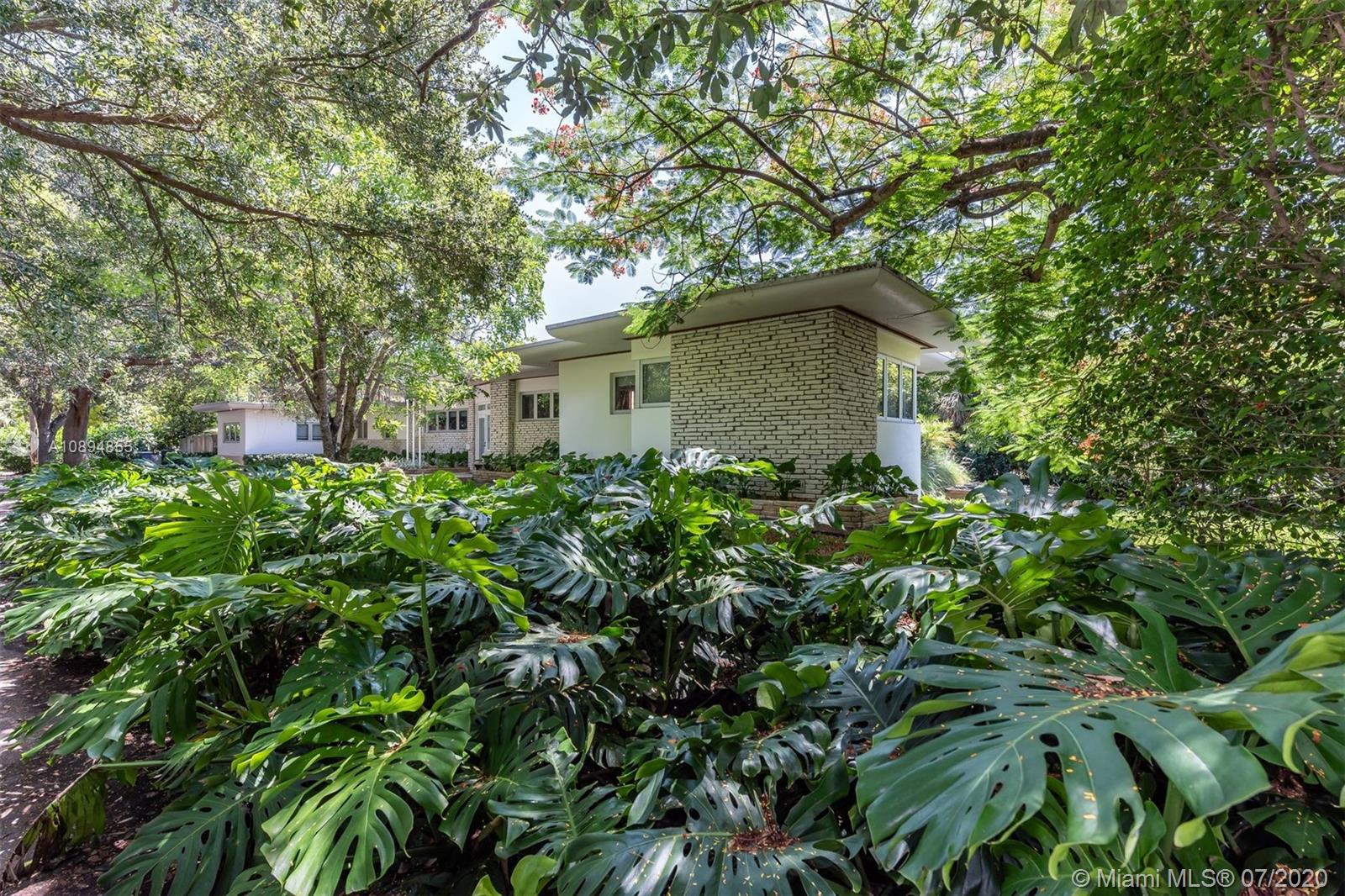 2801 Fairgreen Drive Miami Beach, FL 33140 - Photo 3 of 47 a plant is in a garden