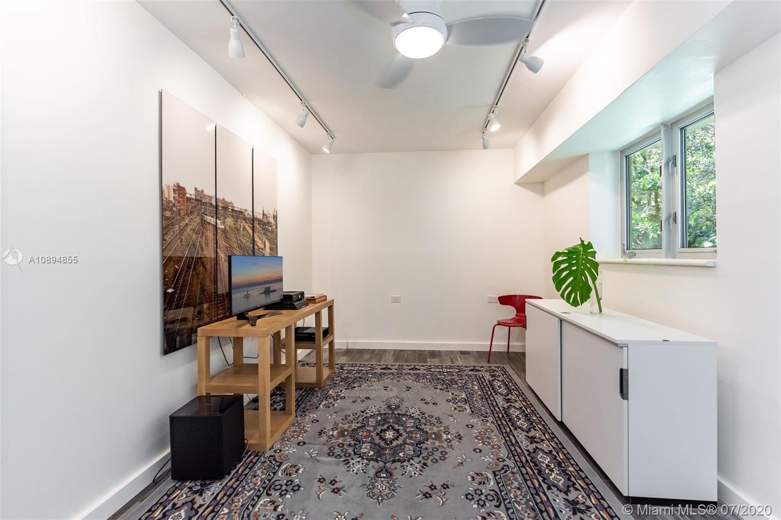 2801 Fairgreen Drive Miami Beach, FL 33140 - Photo 23 of 47 a room with furniture and a potted plant