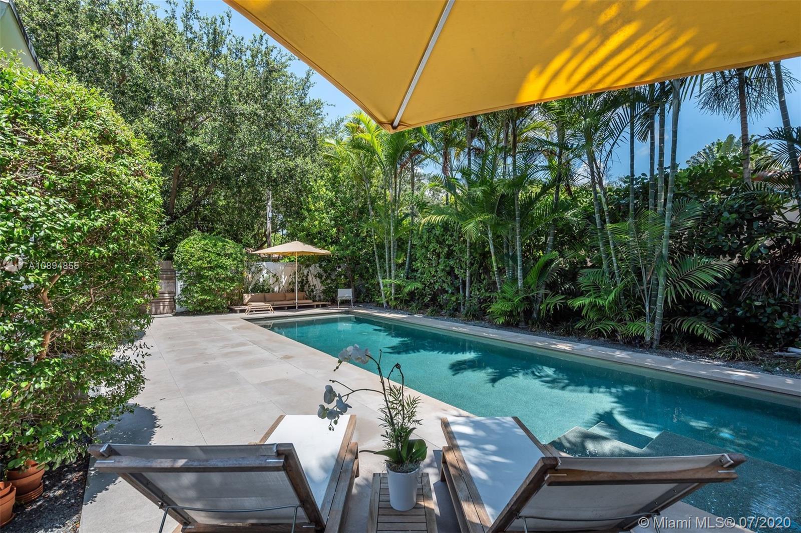 2801 Fairgreen Drive Miami Beach, FL 33140 - Photo 4 of 47 a view of yard with swimming pool and sitting area